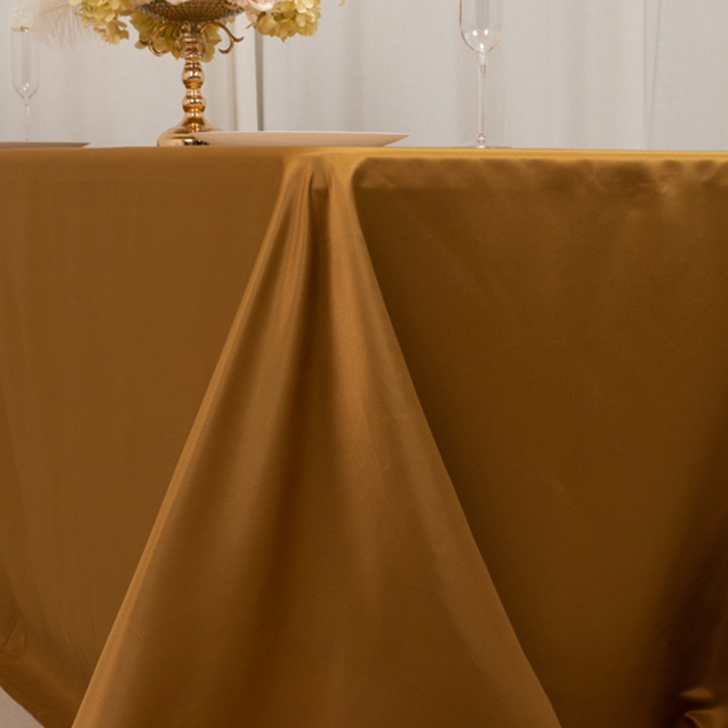 Gold satin tablecloth for a 6-foot table with floor-length drop.