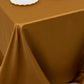 Gold satin tablecloth for 6 foot table with floor-length drop.