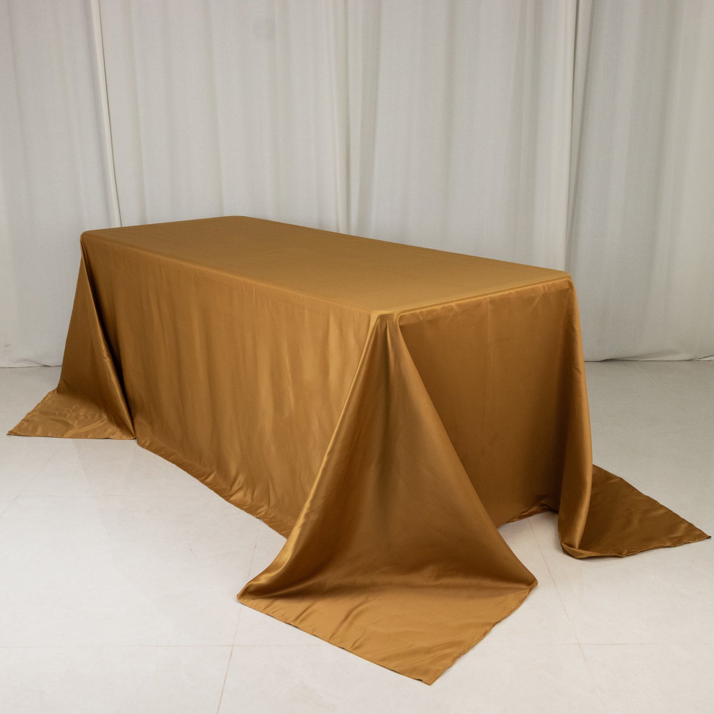 gold satin rectangle tablecloth for 6 foot table with floor-length drop
