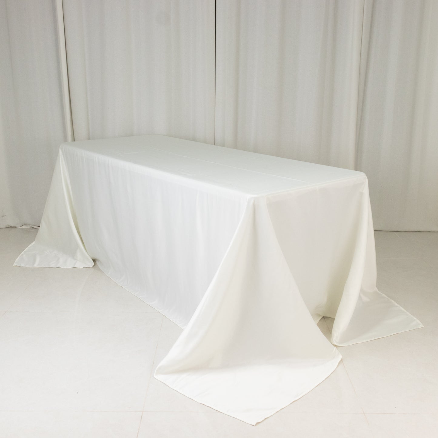 90"x132" Ivory Seamless Lamour Satin Rectangle Tablecloth for 6 Foot Table With Floor-Length Drop