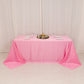 90"x132" pink satin tablecloth for 6 foot table with floor-length drop.