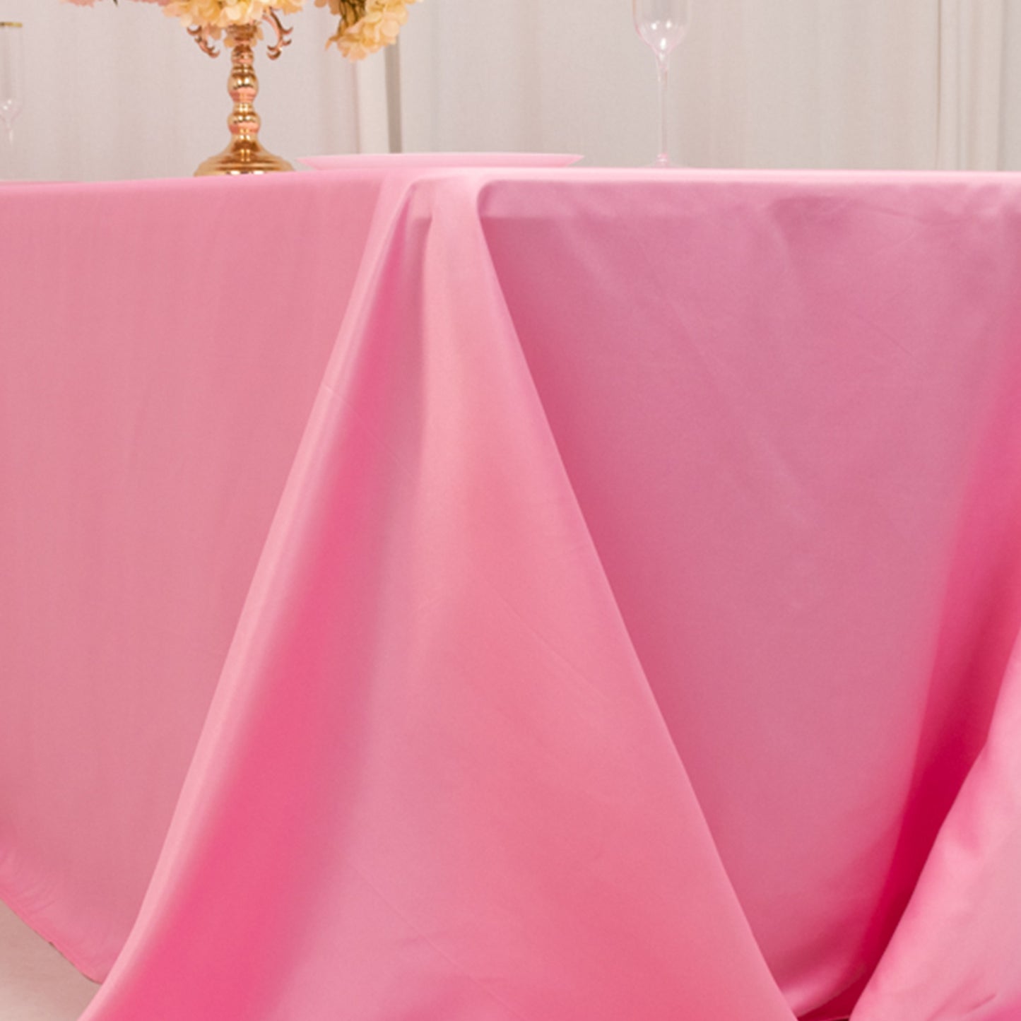 Pink satin tablecloth for a 6-foot table with floor-length drop.