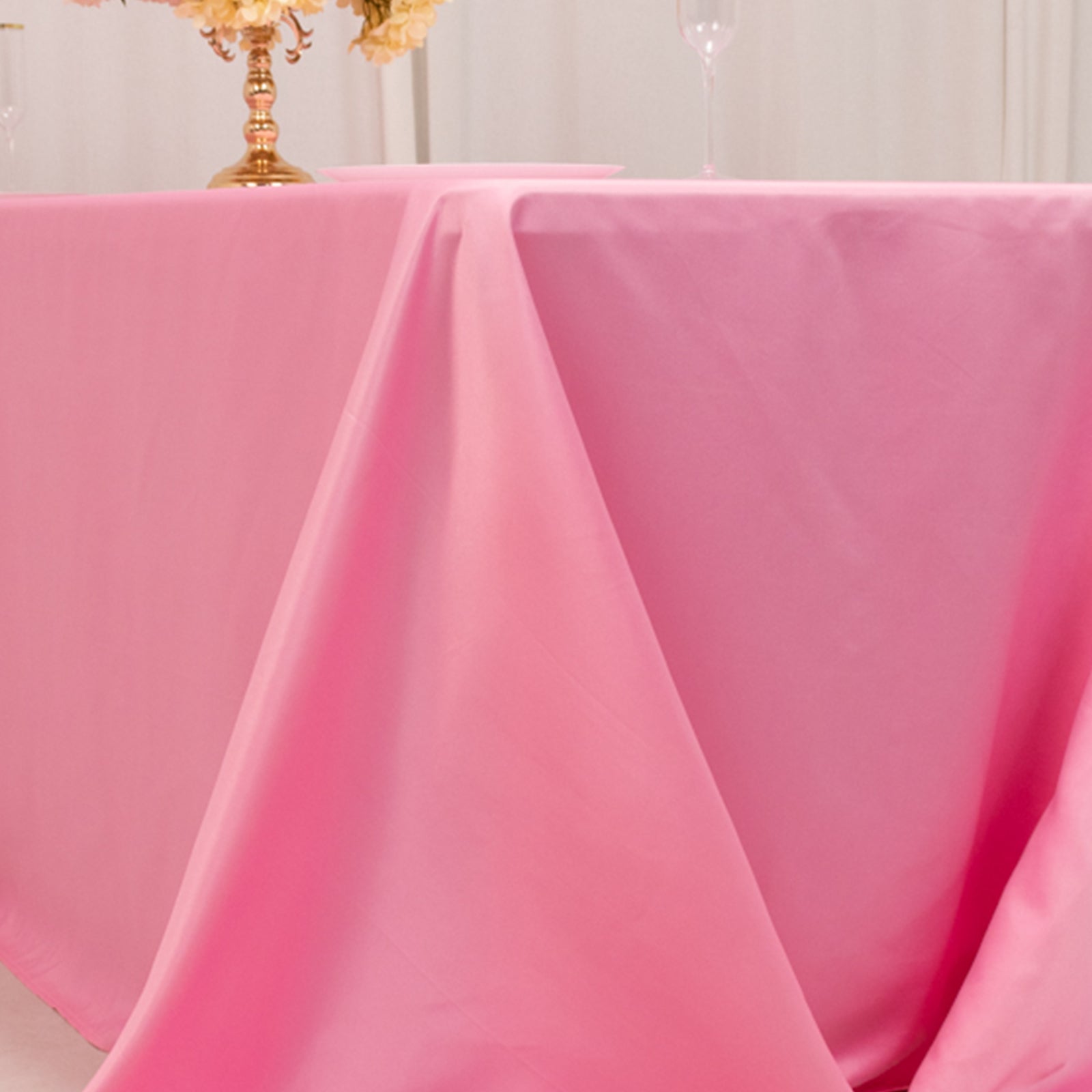 Pink satin tablecloth for a 6-foot table with floor-length drop.