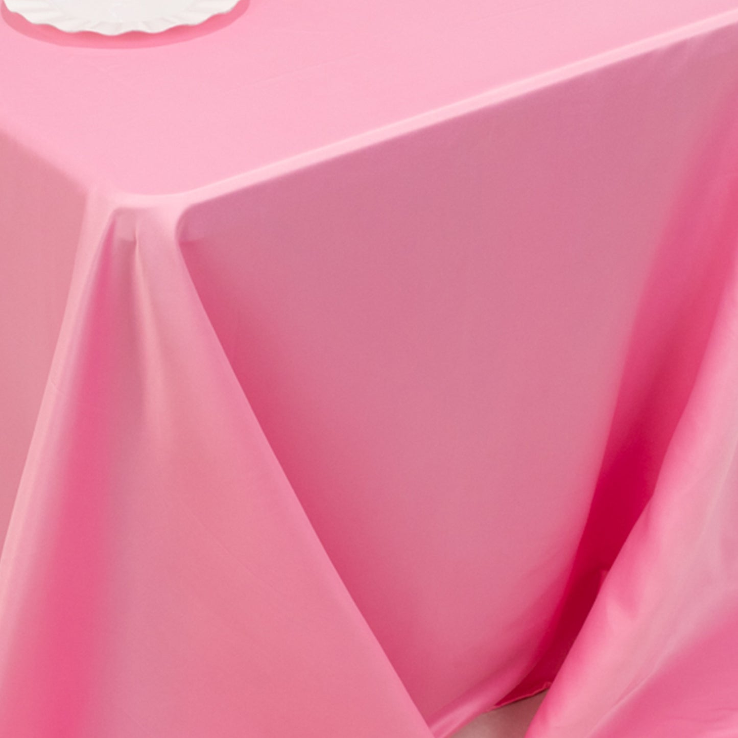 90"x132" pink satin tablecloth for 6 foot table with floor-length drop.
