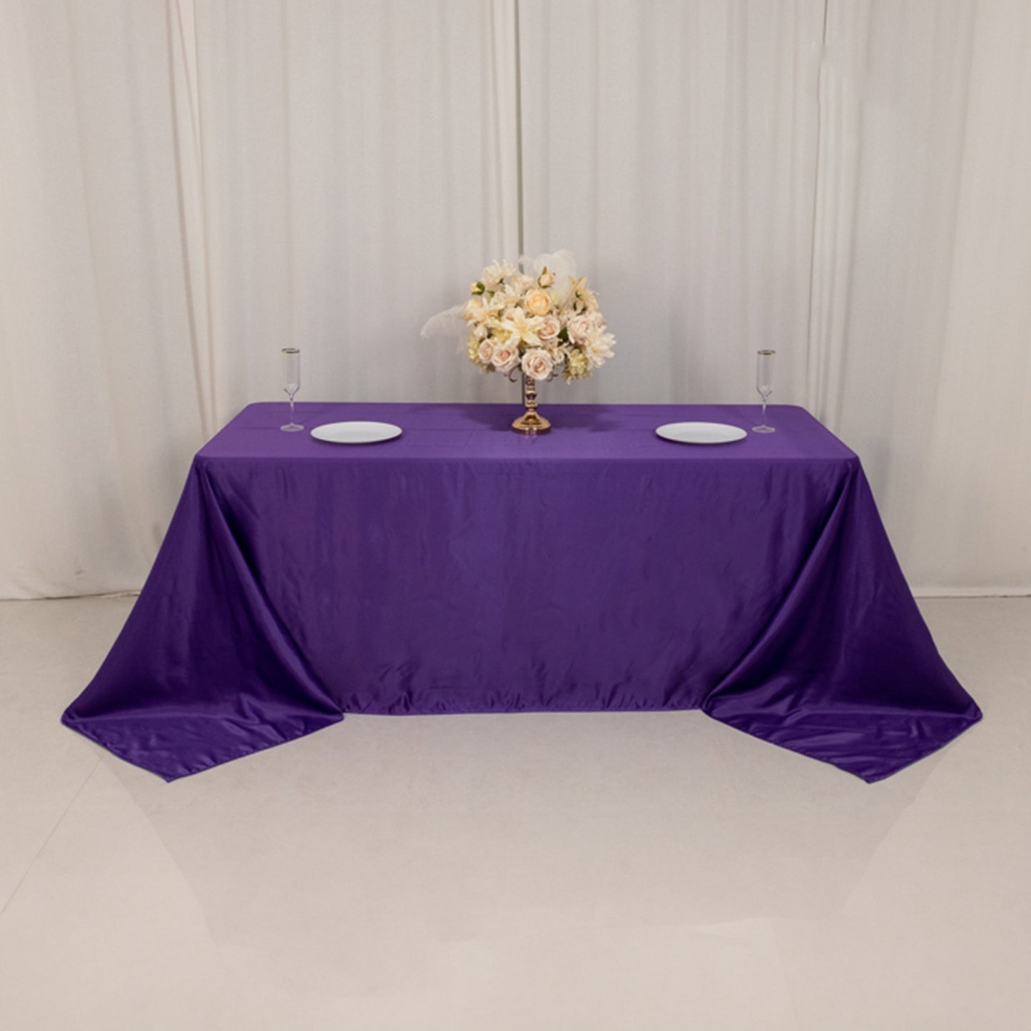 Purple satin tablecloth for a 6-foot table with floor-length drop.