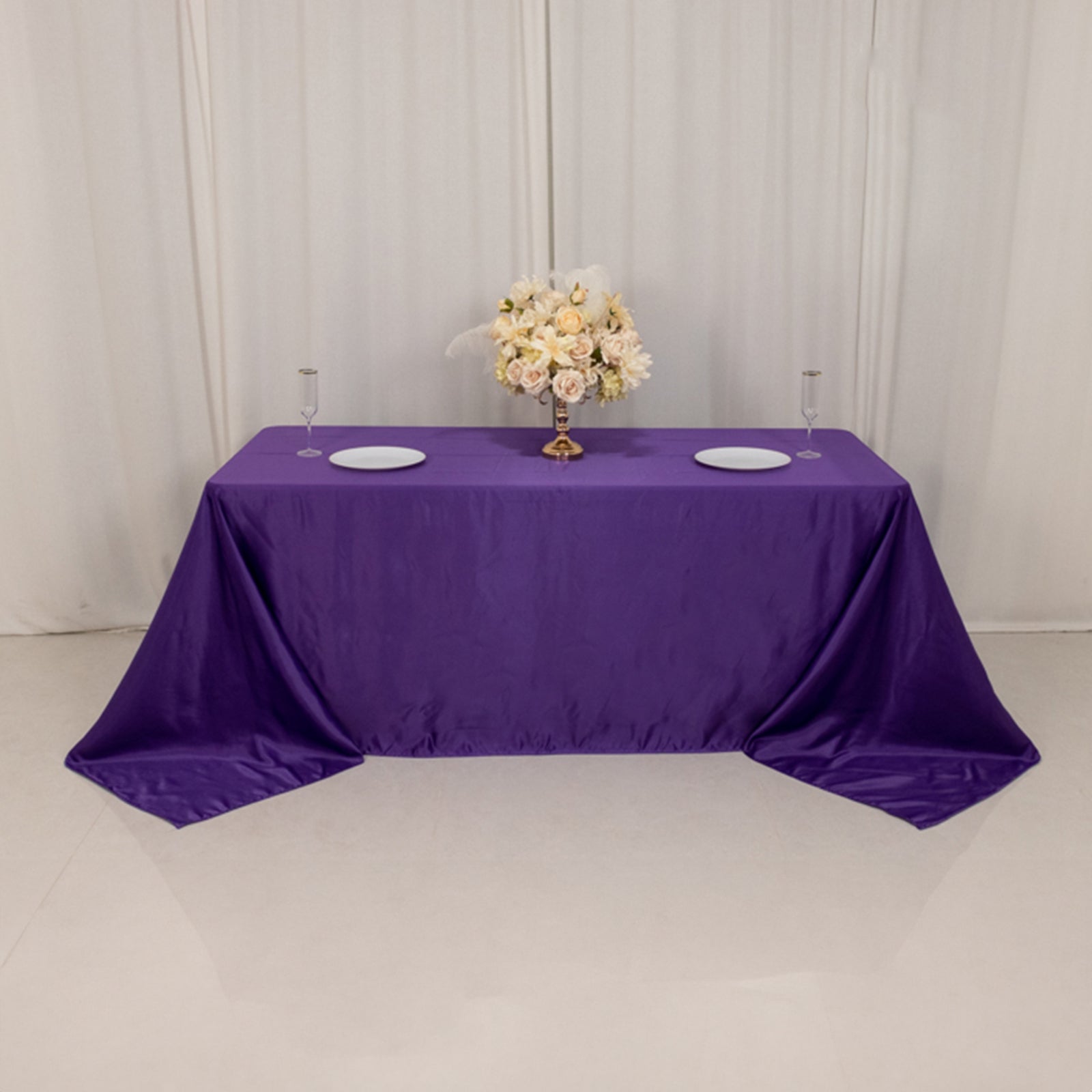 Purple satin tablecloth for a 6-foot table with floor-length drop.
