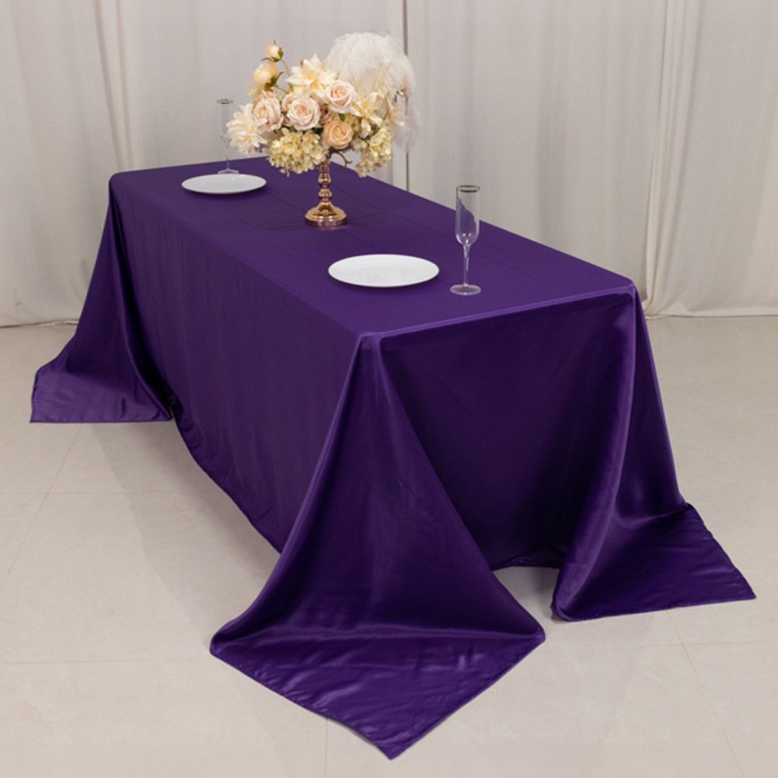 Purple seamless satin tablecloth for 6-foot table with floor-length drop.