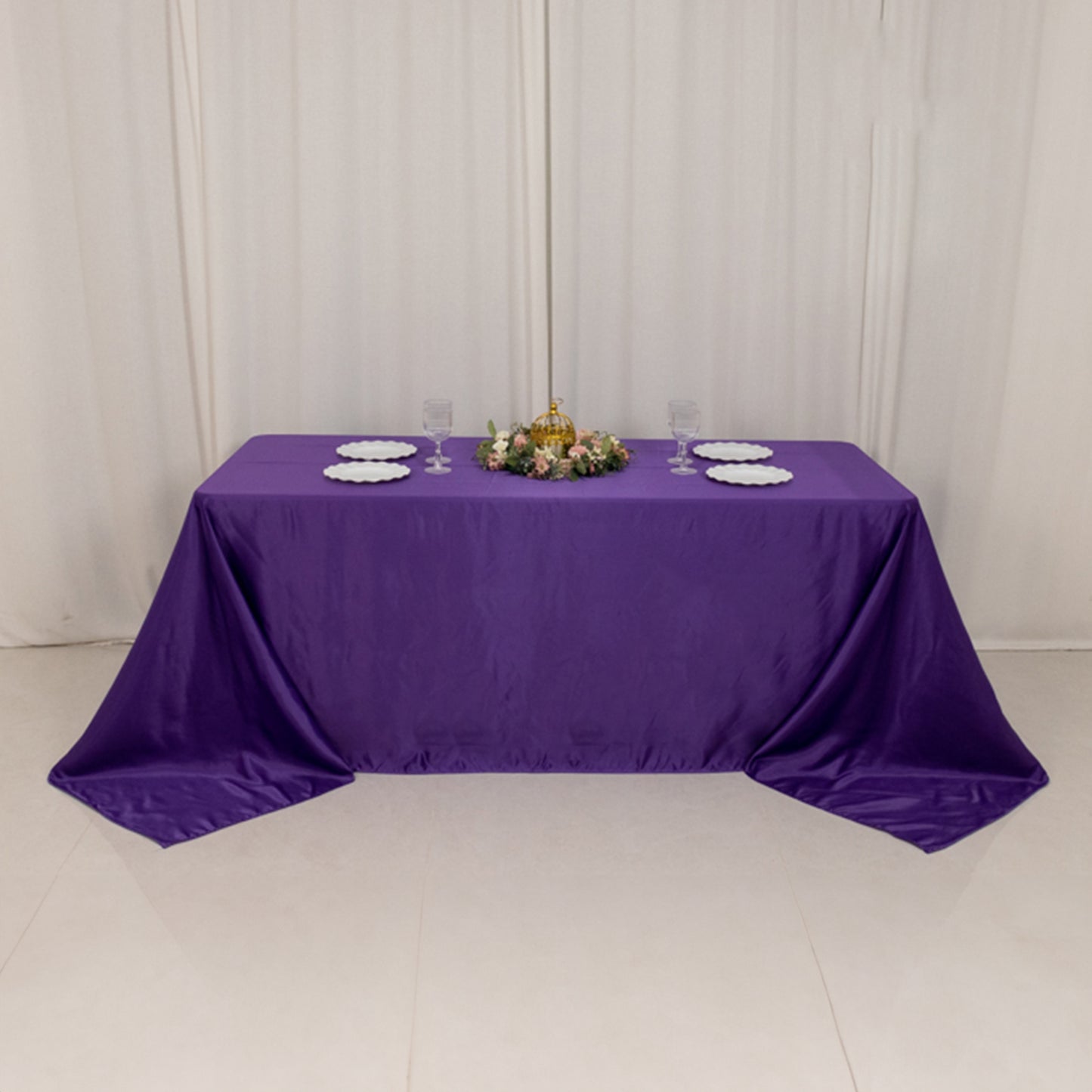Purple satin tablecloth for a 6-foot table with floor-length drop.