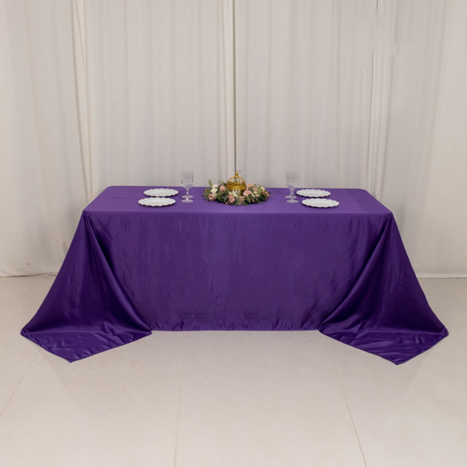 Purple satin tablecloth for a 6-foot table with floor-length drop.