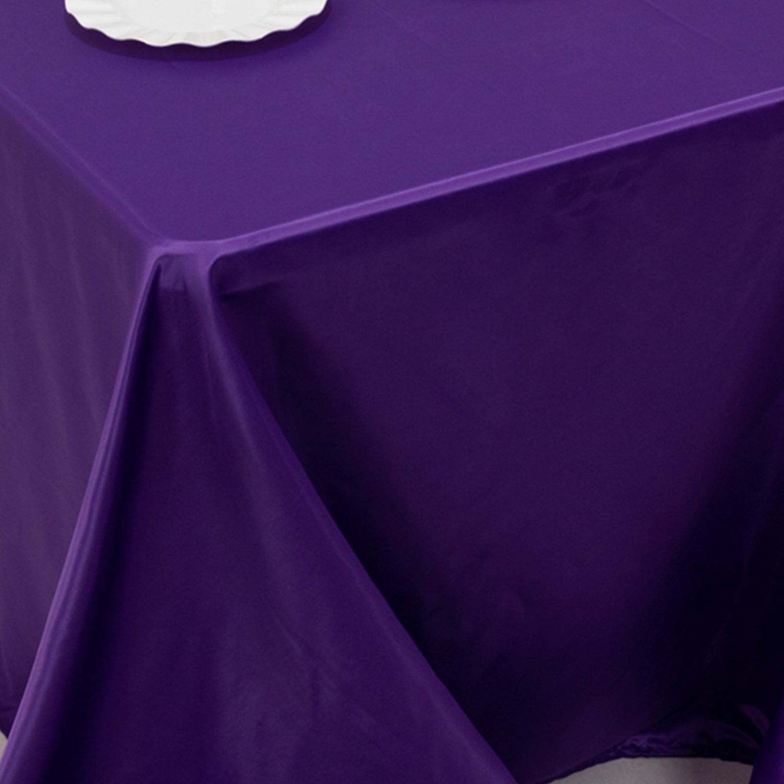 Purple satin tablecloth for 6-foot table with floor-length drop.