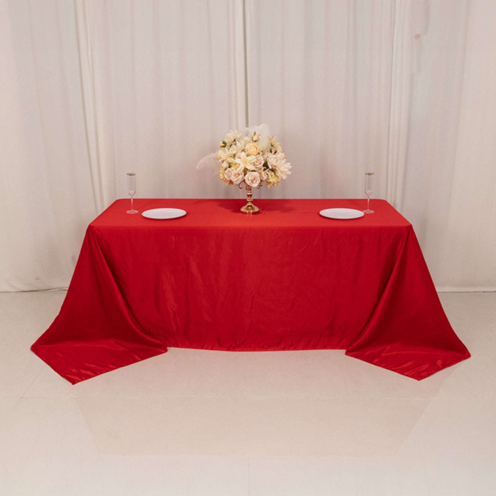 Red satin tablecloth for a 6-foot table with a floor-length drop.