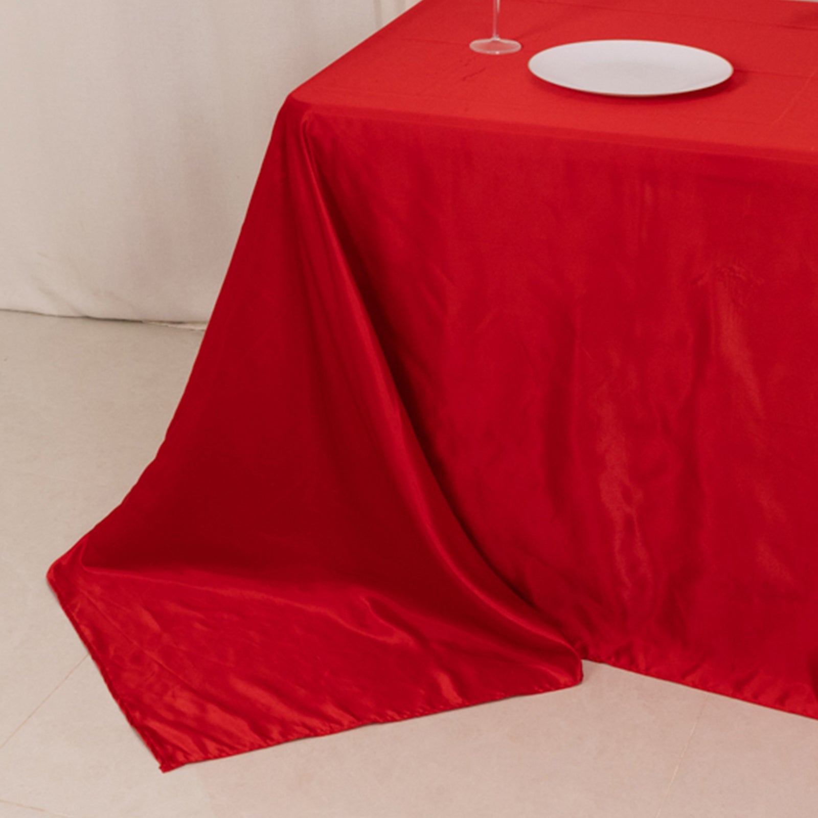 Red satin tablecloth for 6-foot table with floor-length drop.
