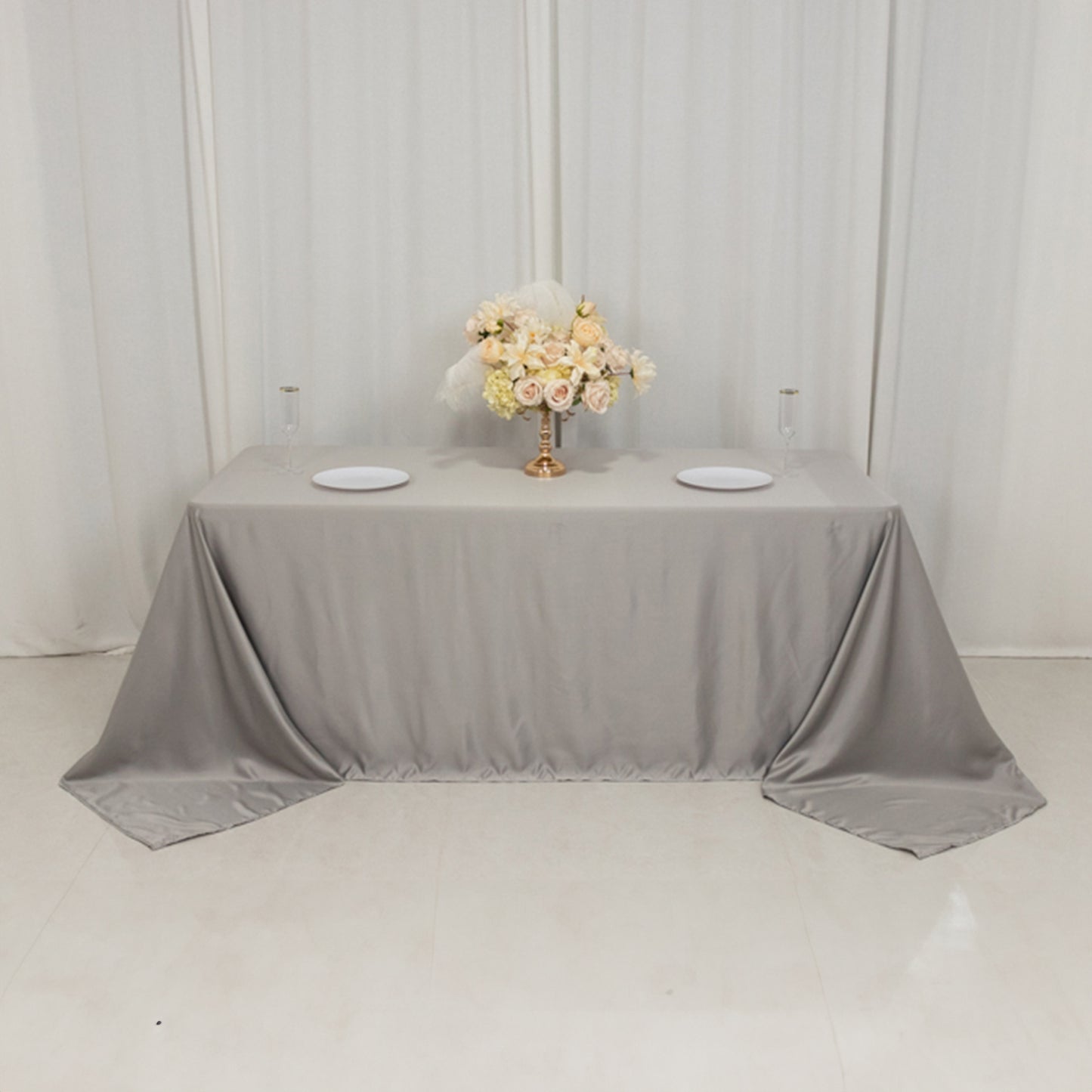 Silver tablecloth for 6-foot table with floor-length drop.