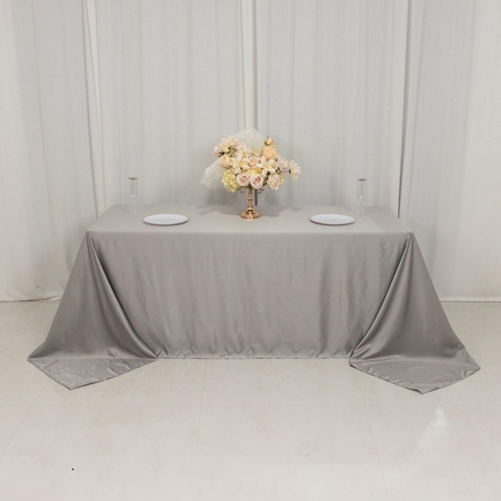 Silver tablecloth for 6-foot table with floor-length drop.