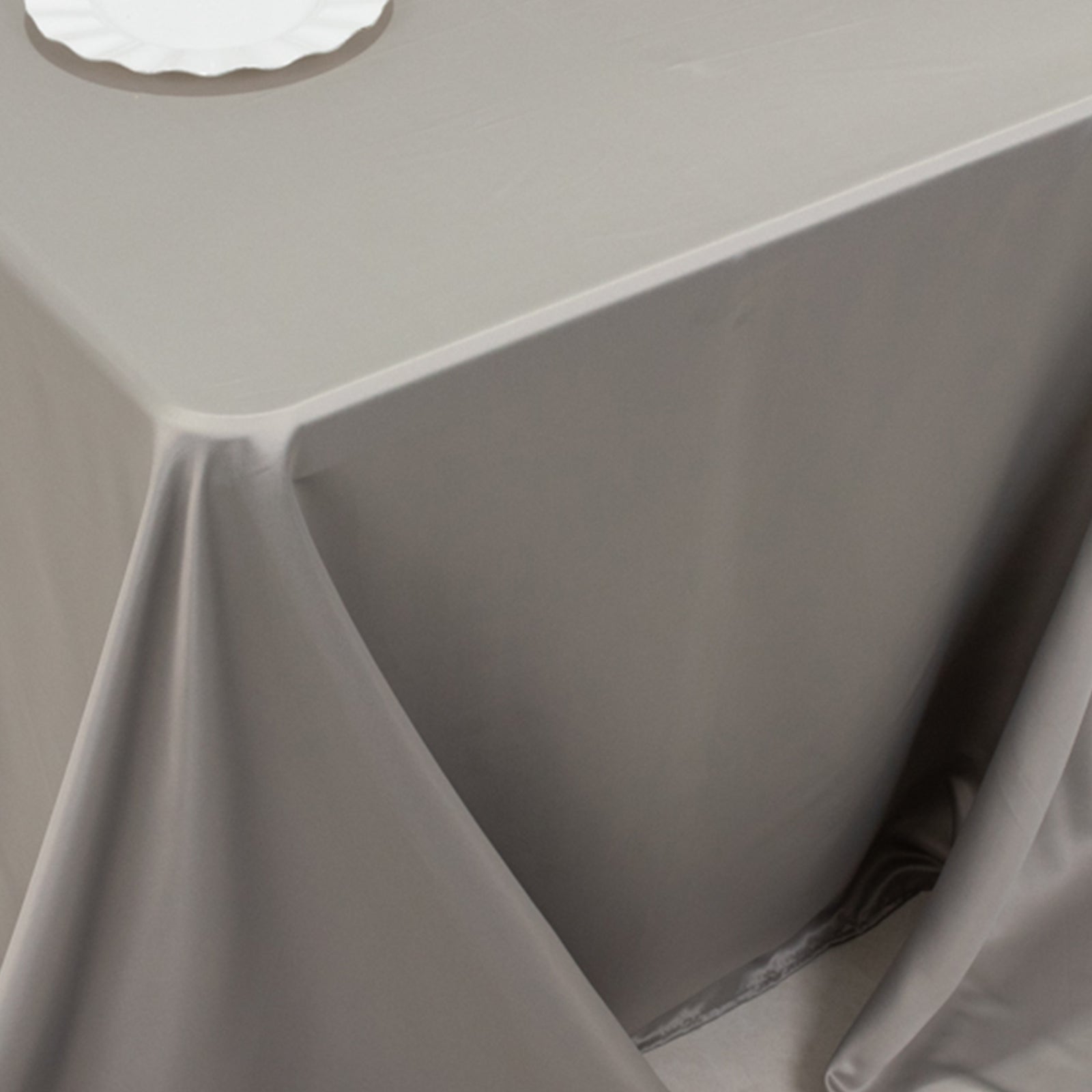 Silver satin tablecloth for 6-foot table with floor-length drop.