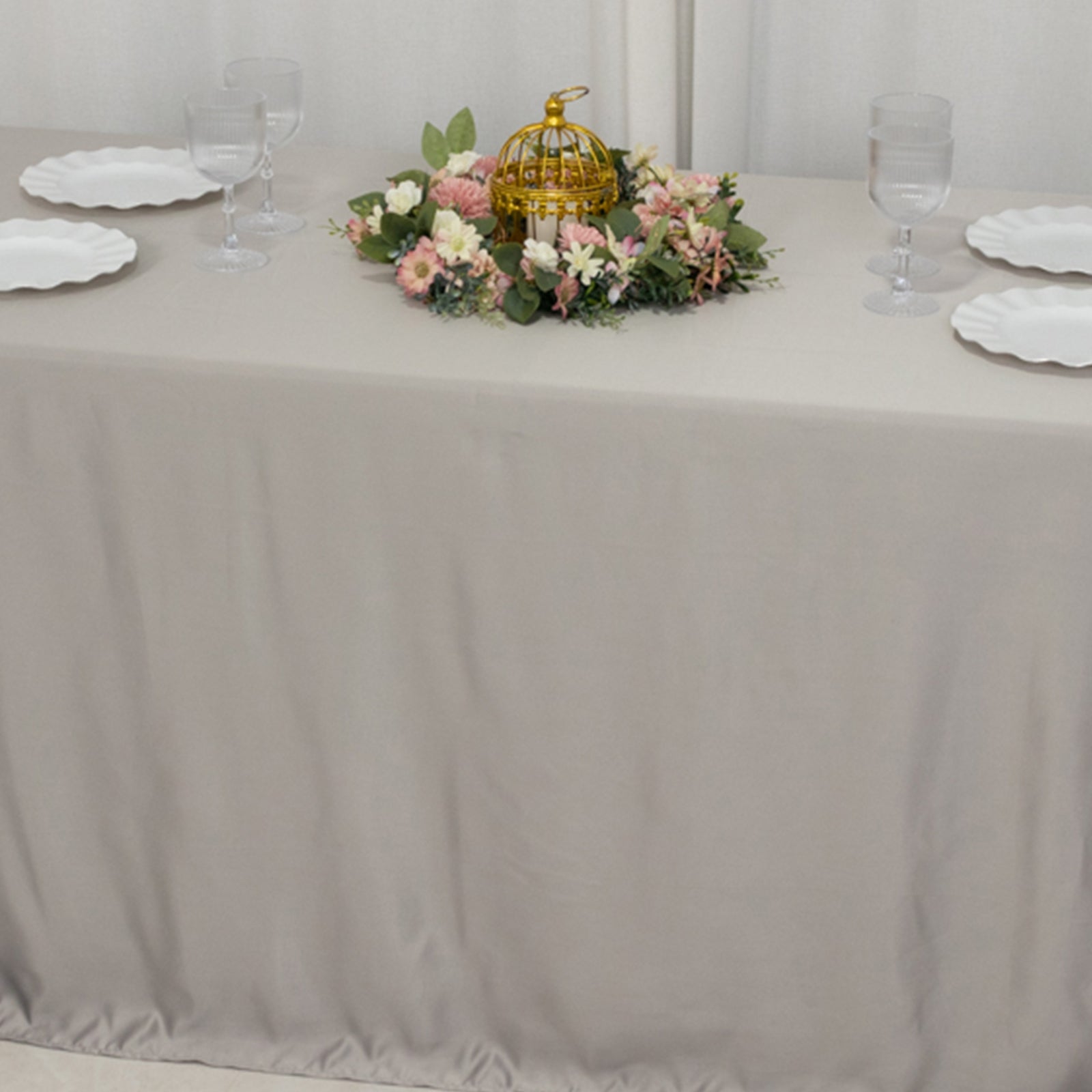 Beige tablecloth for 6-foot table with floor-length drop.