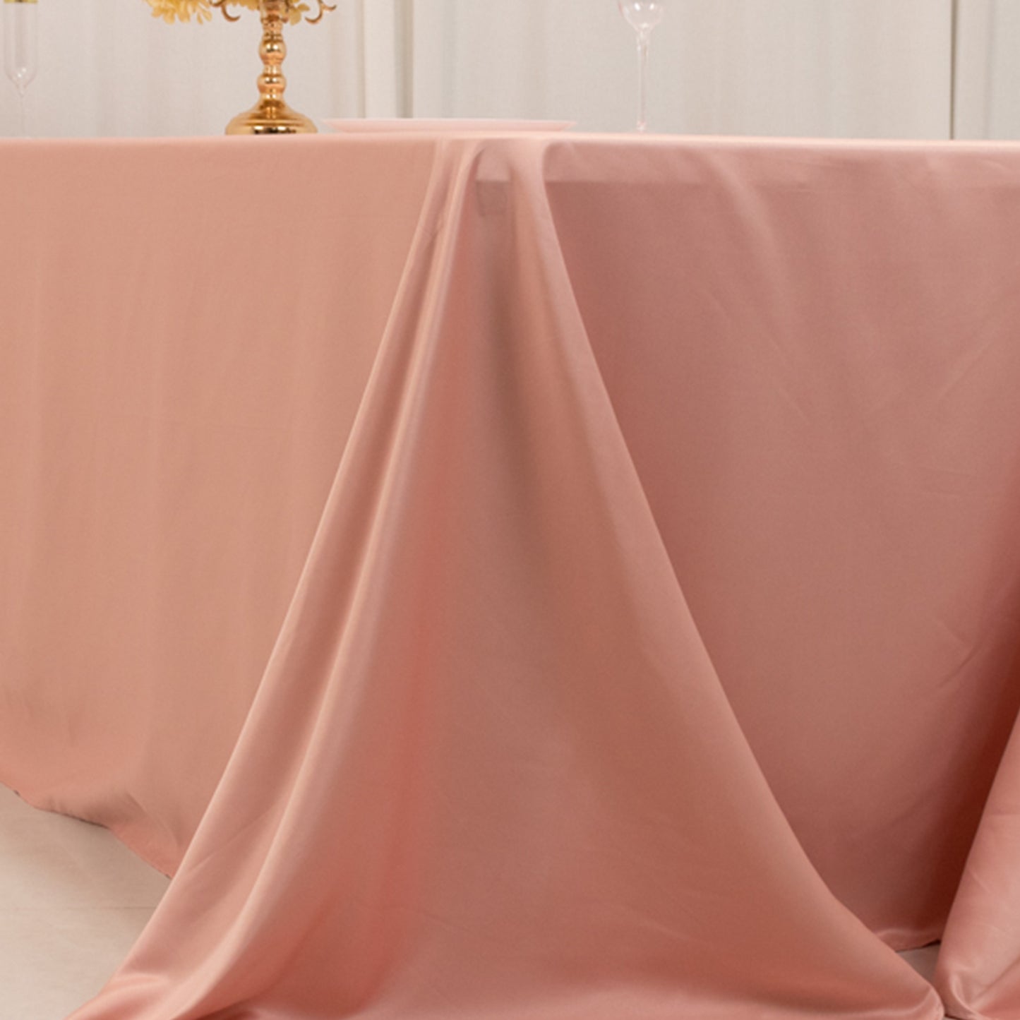 Dusty rose satin tablecloth for 8-foot table with floor-length drop.
