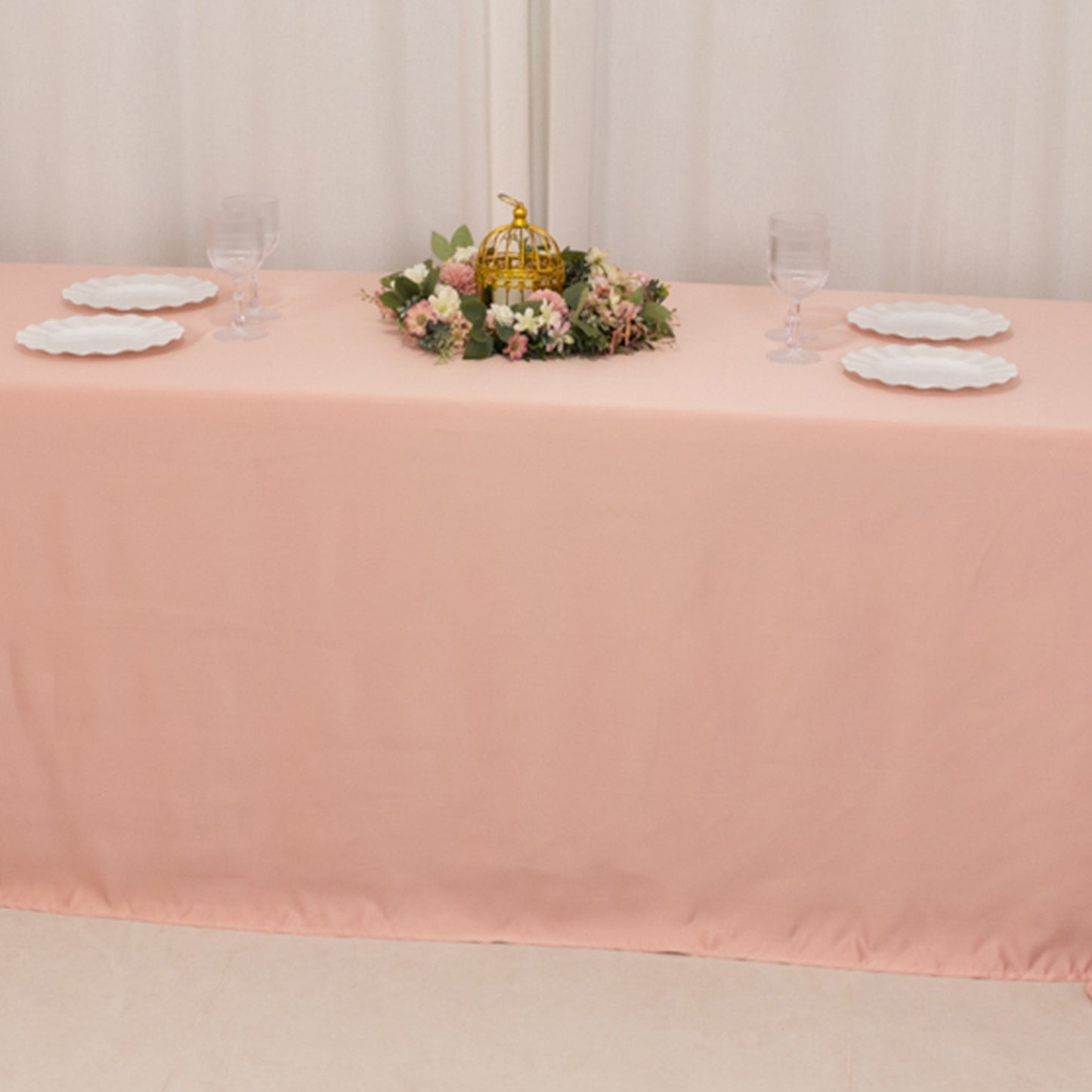 Dusty rose satin tablecloth for an 8-foot table with floor-length drop.