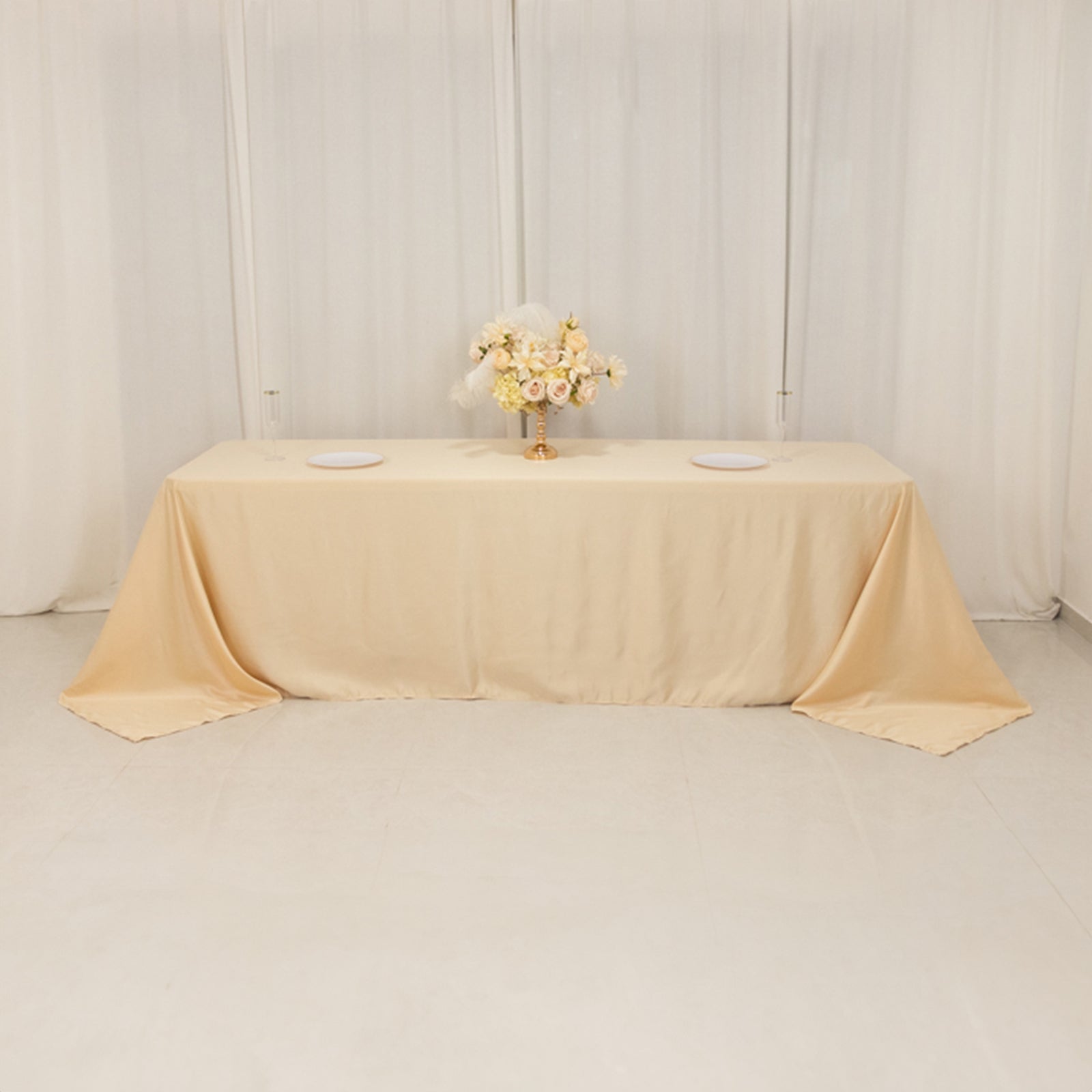Beige satin tablecloth for 8-foot table with floor-length drop.