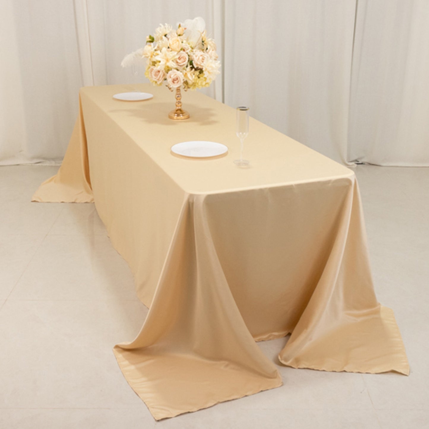 Beige seamless satin tablecloth for 8-foot table with floor-length drop.