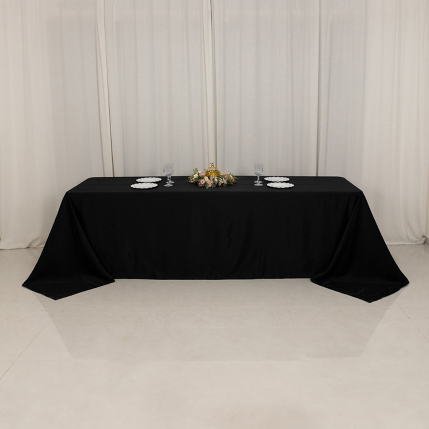 Black satin tablecloth for 8-foot table with floor-length drop.