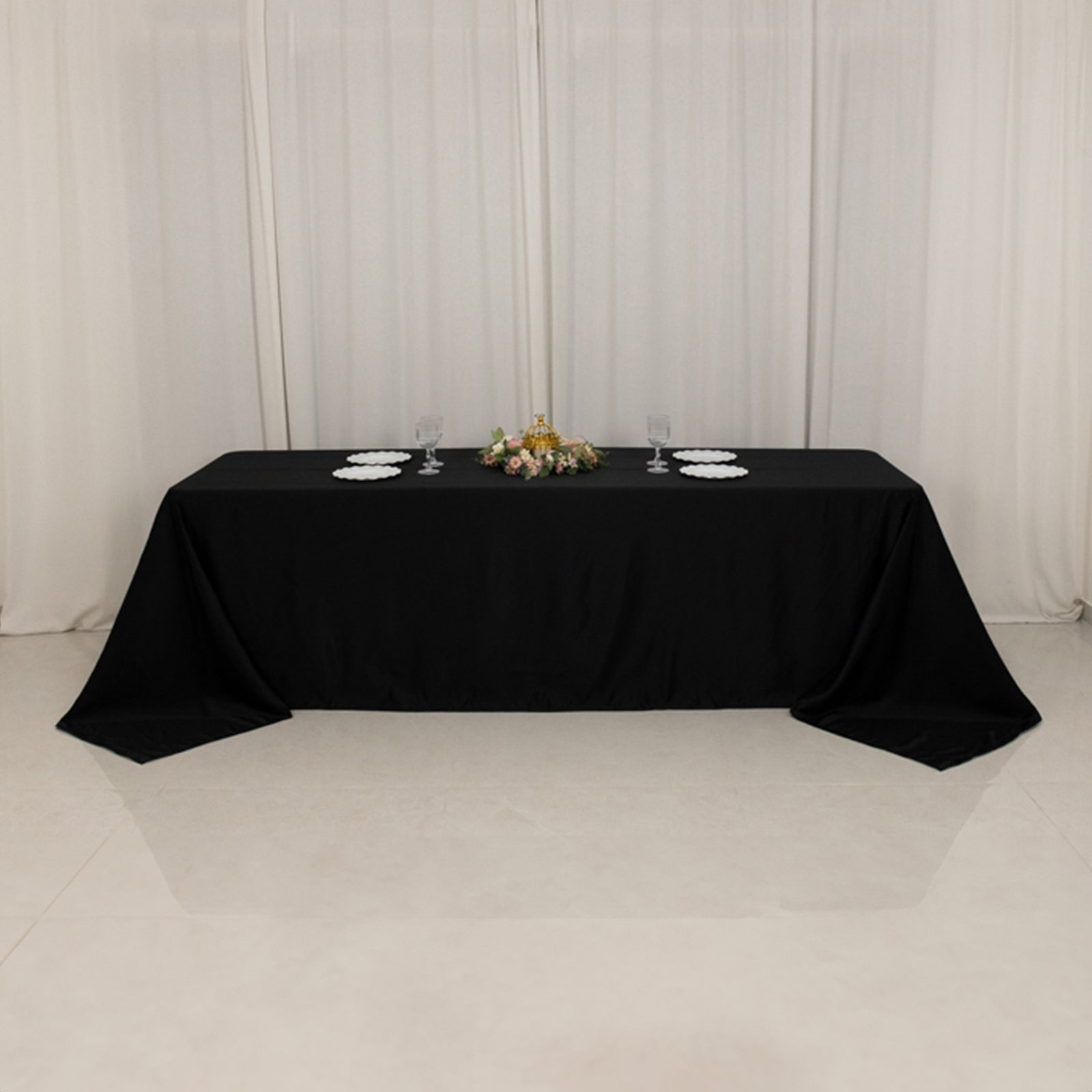Black satin tablecloth for 8-foot table with floor-length drop.