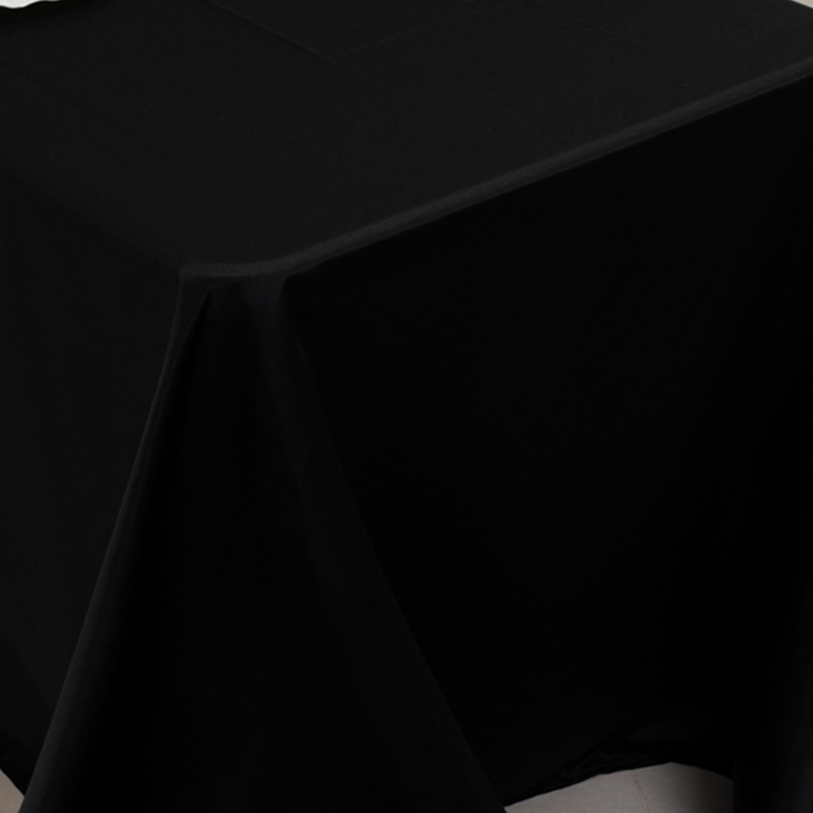Black satin tablecloth for 8-foot table with floor-length drop.