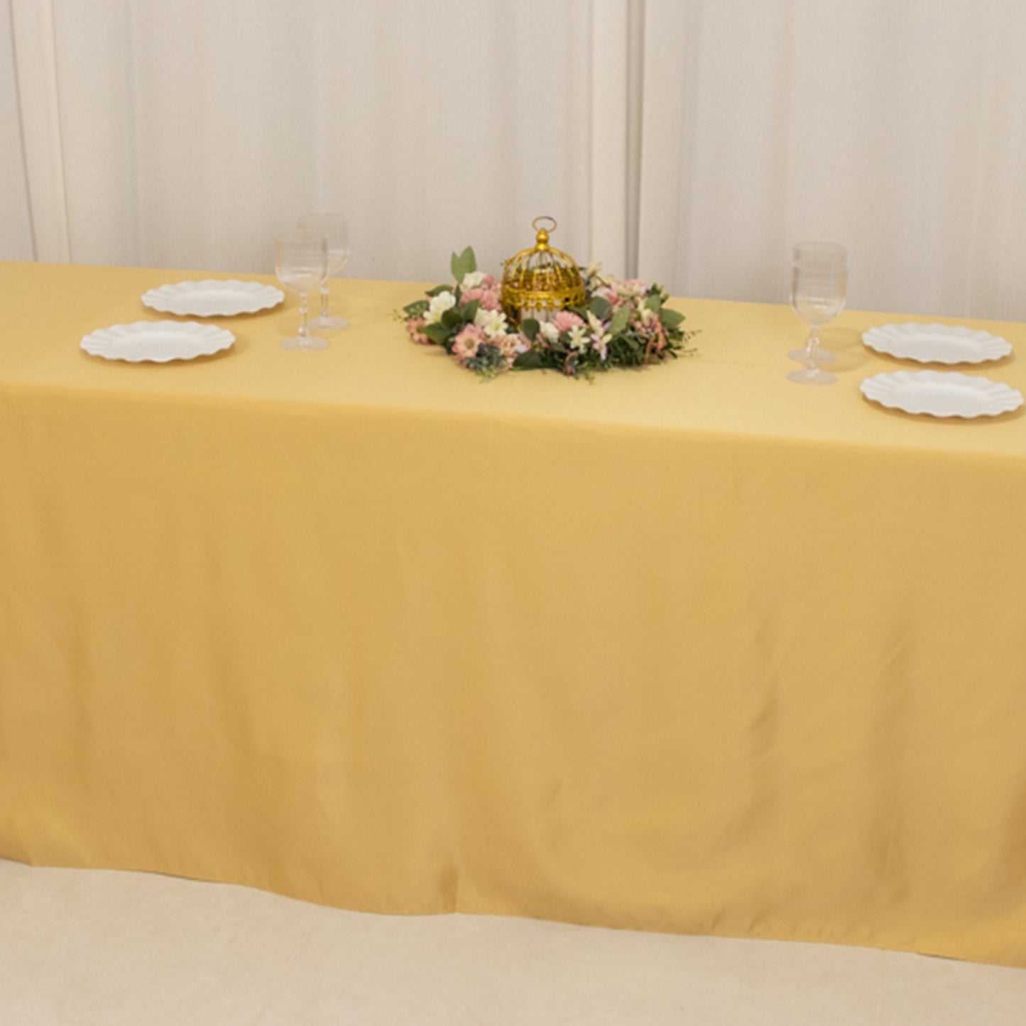 Champagne satin tablecloth for 8-foot table with floor-length drop.
