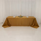Gold seamless satin tablecloth for an 8-foot table with floor-length drop.