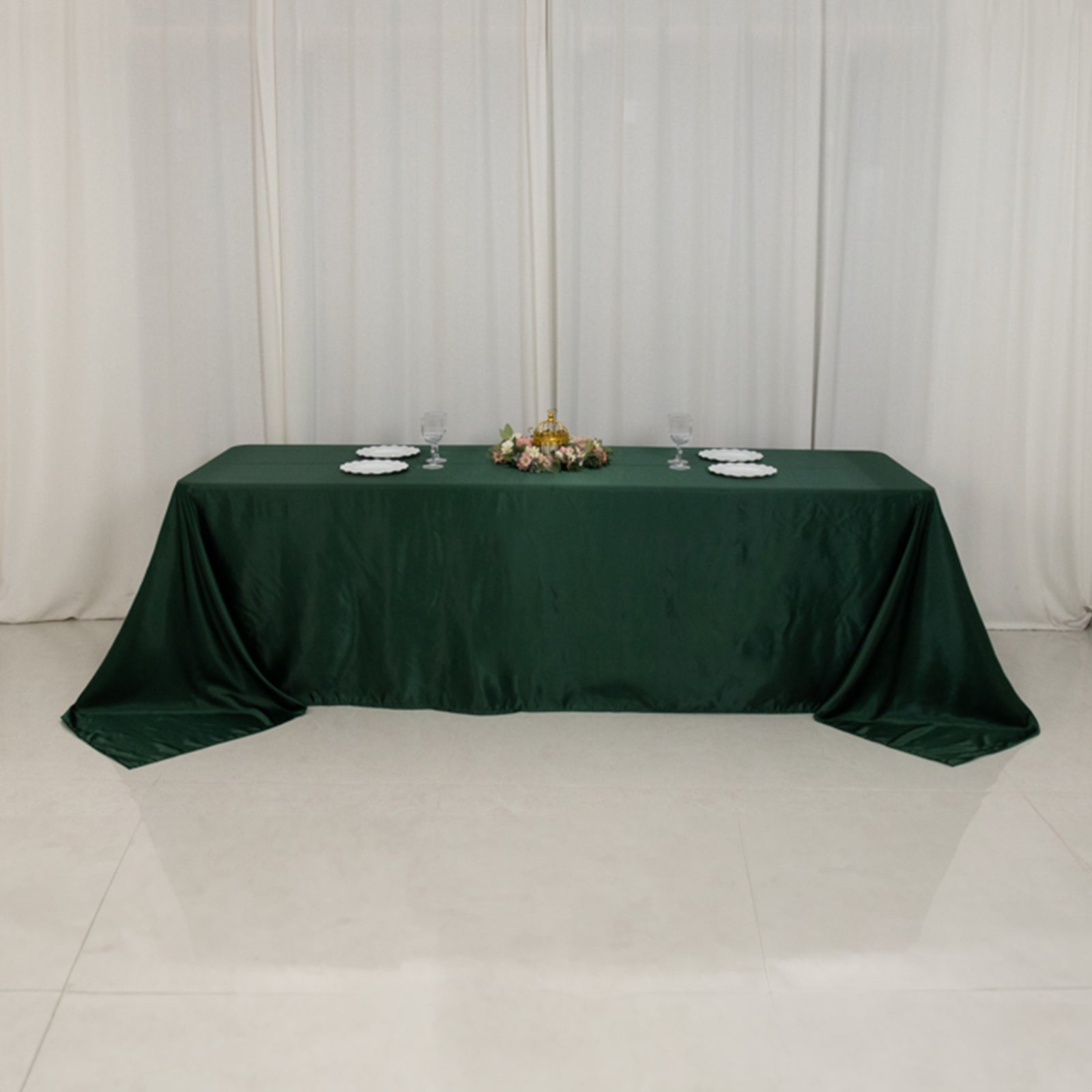 Hunter Emerald Green tablecloth on an 8-foot table with a floor-length drop.