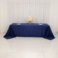 Navy blue seamless satin tablecloth for 8-foot table with floor-length drop.