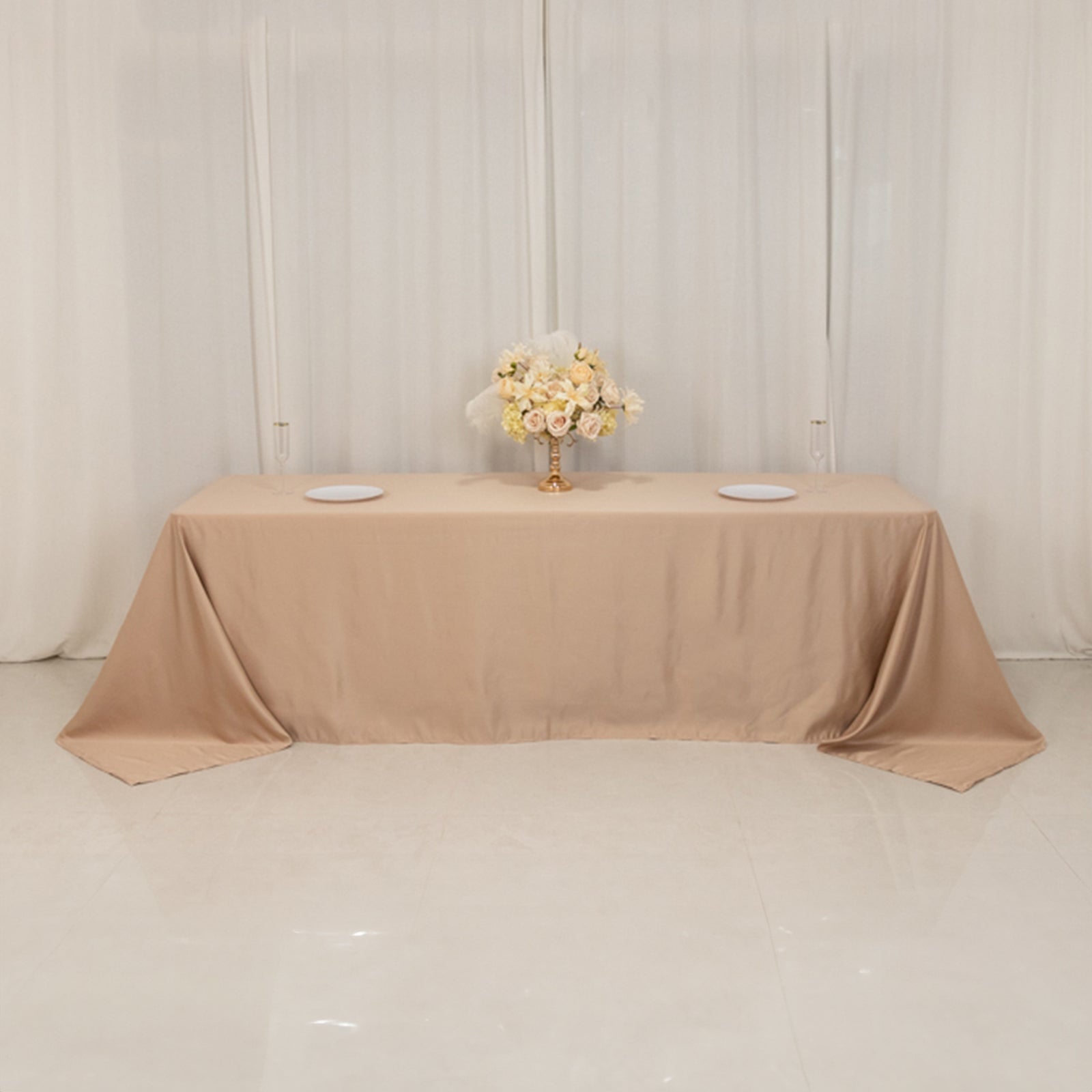 Nude seamless satin tablecloth for 8-foot table with floor-length drop.