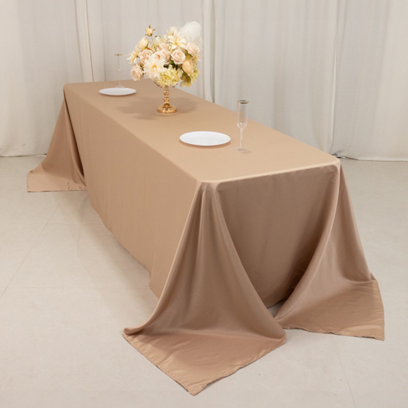 Nude seamless satin tablecloth for 8-foot table with floor-length drop.