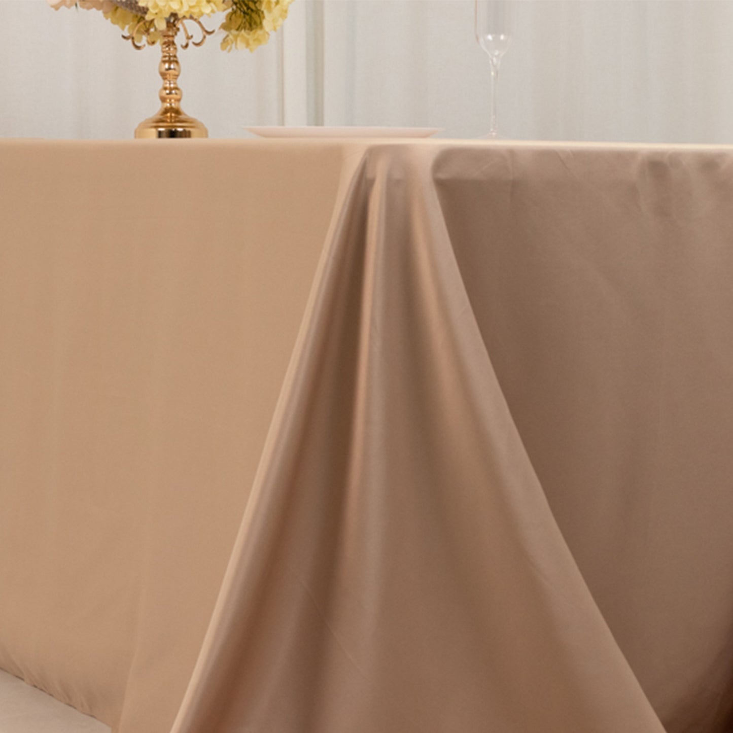 Nude satin tablecloth for 8-foot table with floor-length drop.