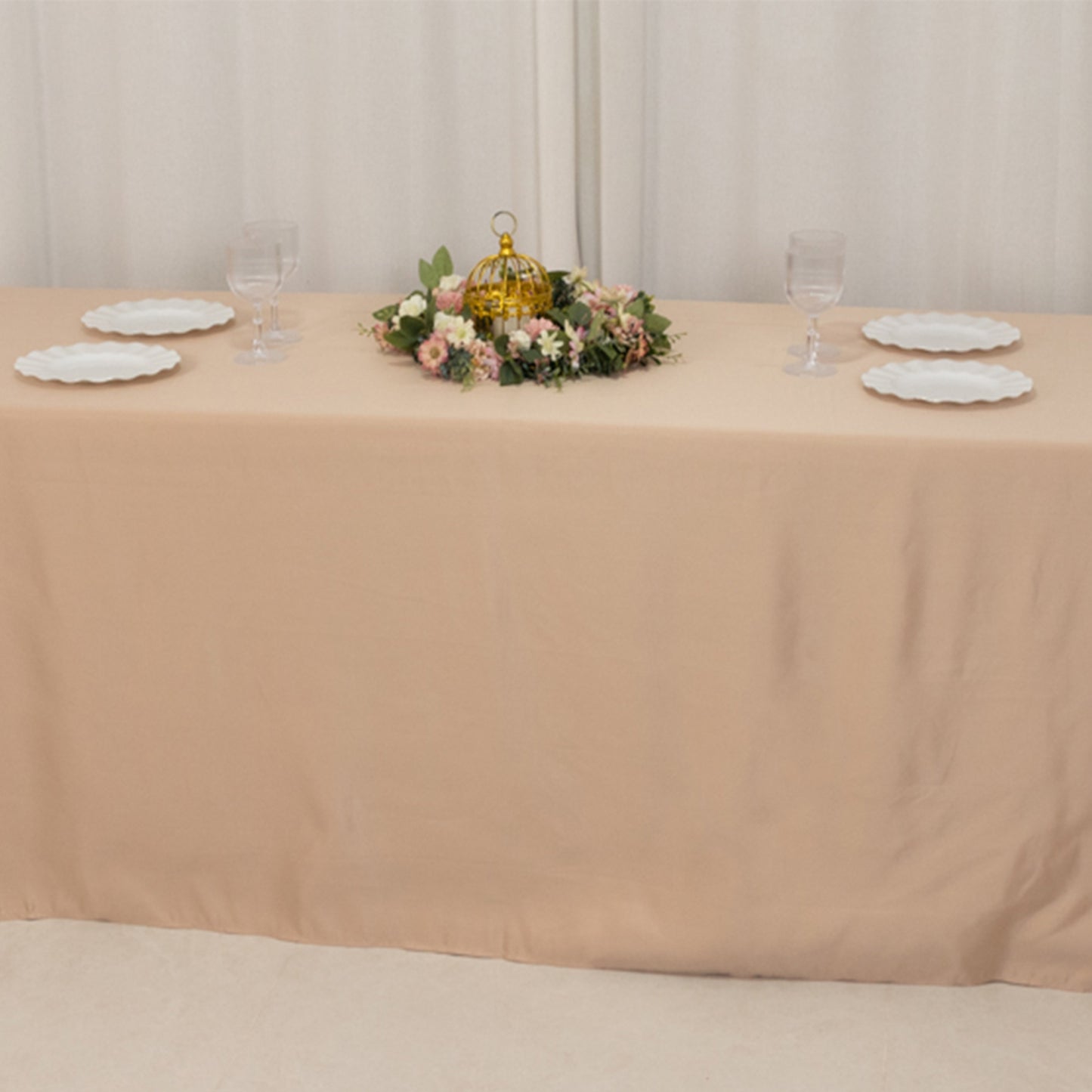Nude seamless satin tablecloth for 8-foot table with floor-length drop.