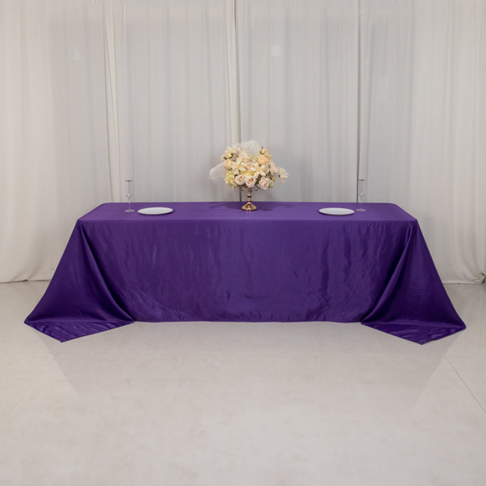 Purple seamless satin tablecloth for 8-foot table with floor-length drop.