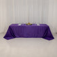 Purple satin tablecloth for 8-foot table with floor-length drop.