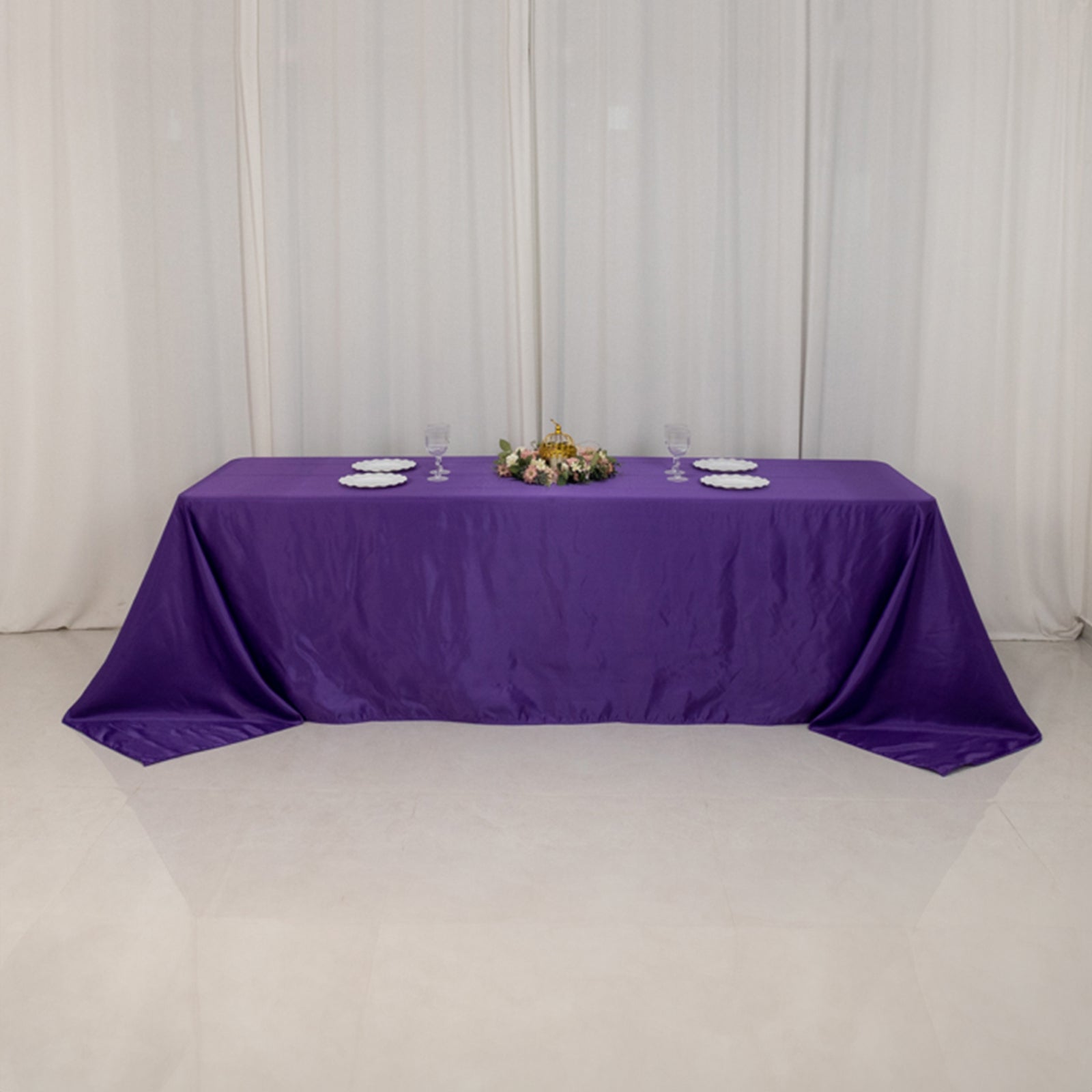 Purple satin tablecloth for 8-foot table with floor-length drop.