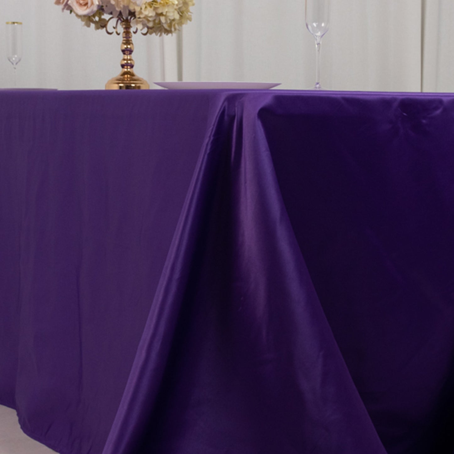 Purple satin tablecloth for an 8-foot table with floor-length drop.