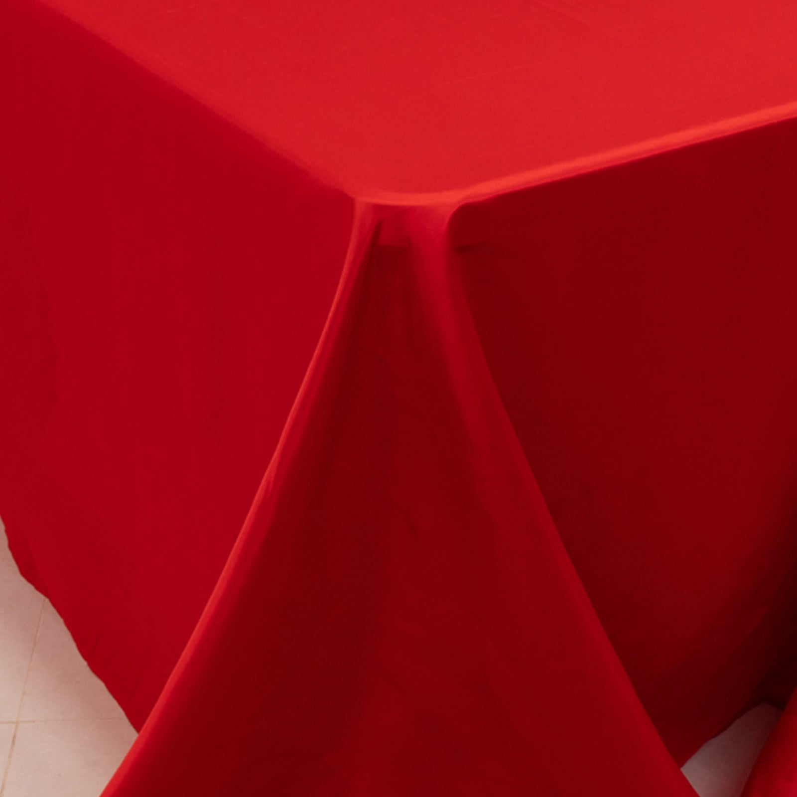 Red satin tablecloth for 8-foot table with floor-length drop.