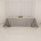 Silver satin tablecloth for 8-foot table with floor-length drop.