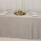 Silver seamless satin tablecloth for 8-foot table with floor-length drop.