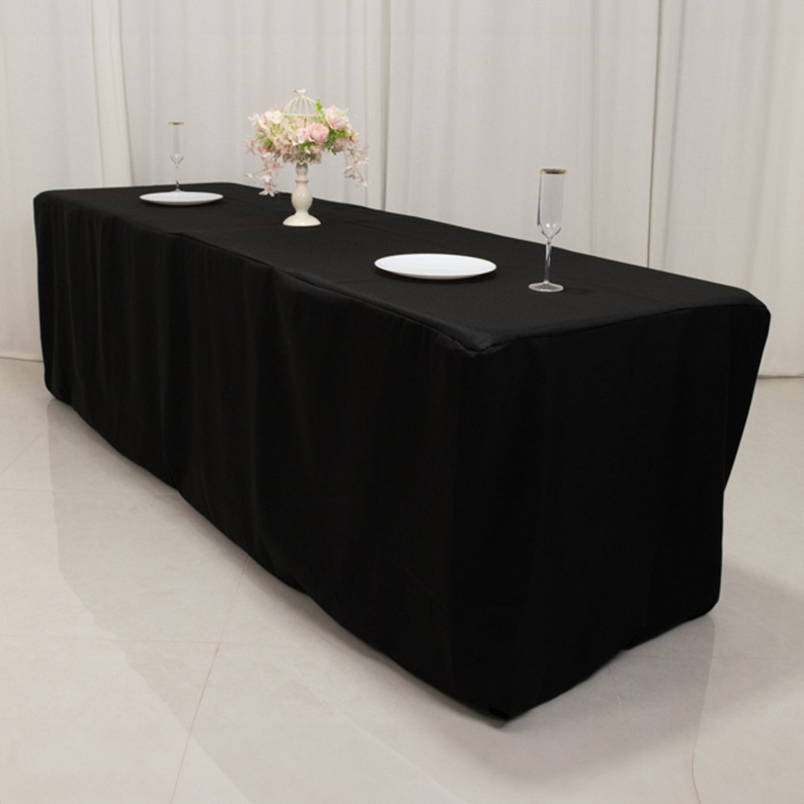 Black fitted premium polyester tablecloth for 8ft tables.
