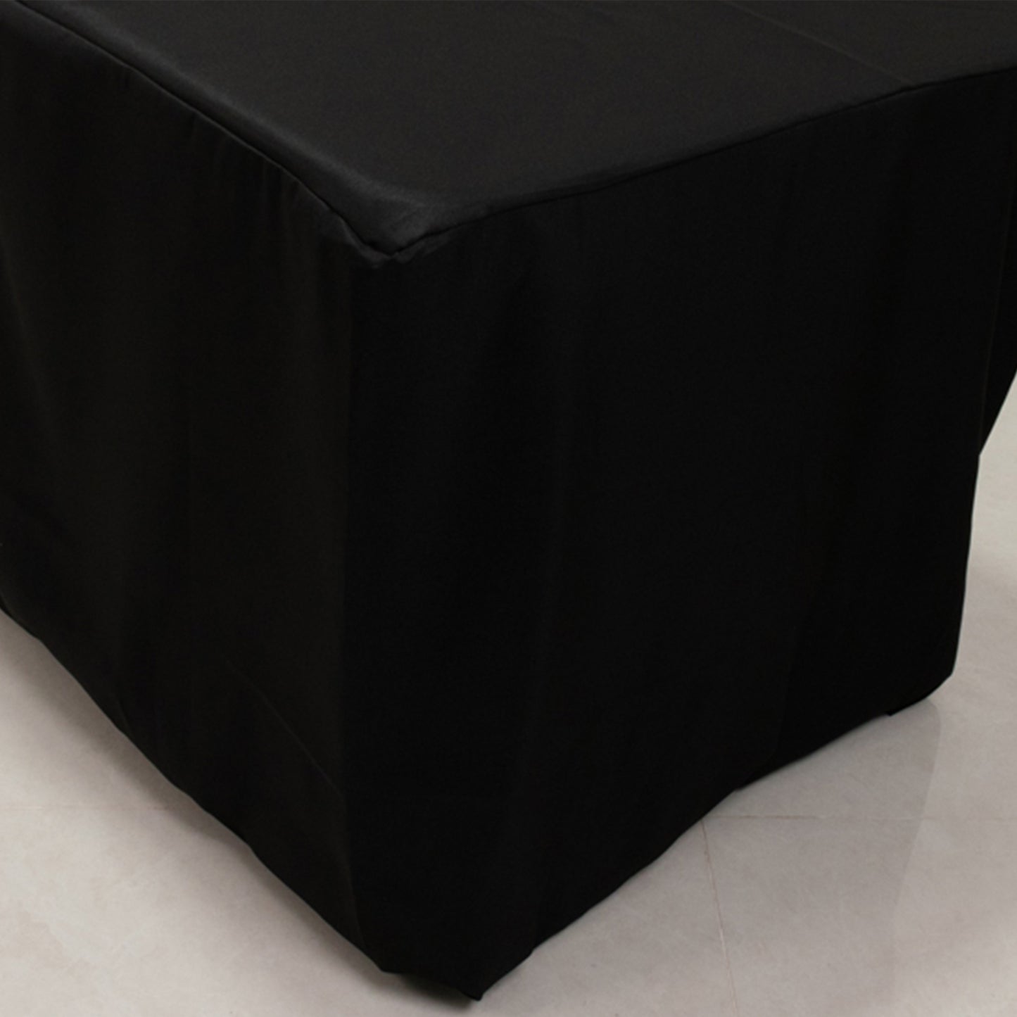 Black fitted premium polyester tablecloth for 8ft tables.