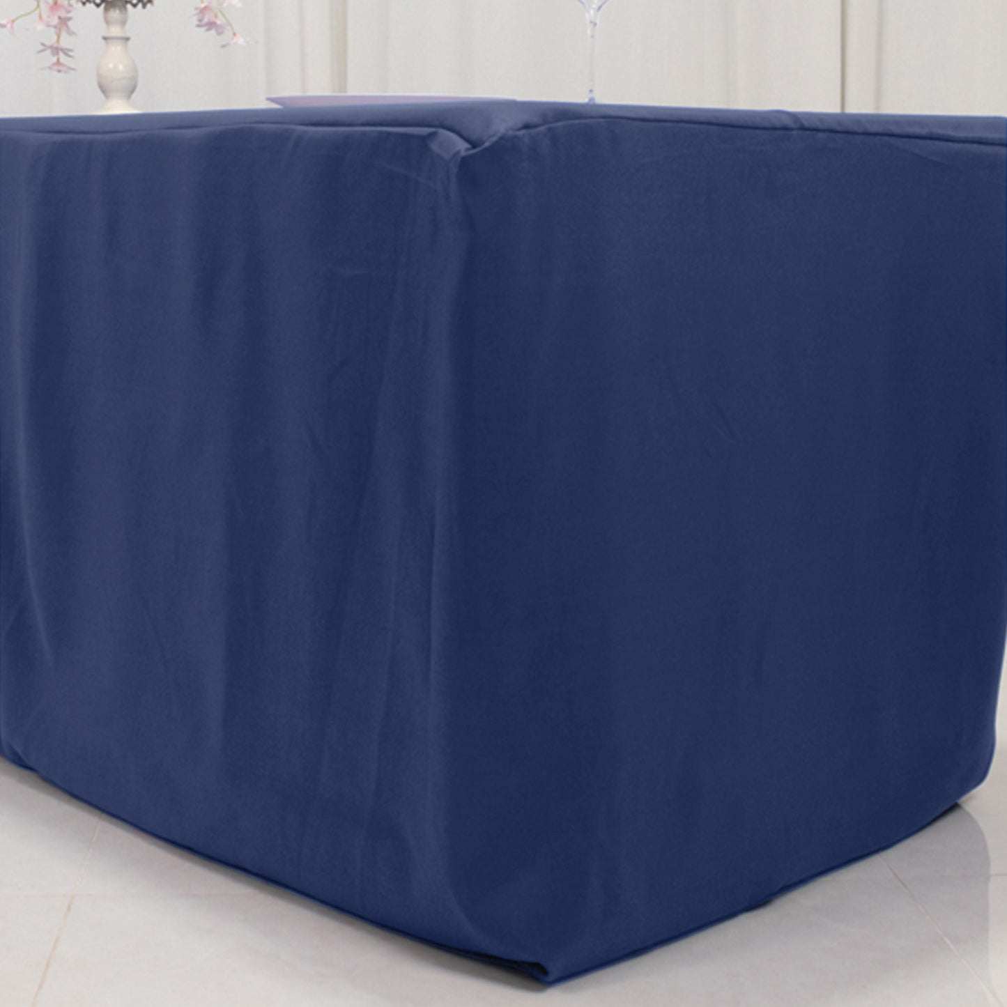 Navy blue fitted tablecloth for 8ft tables, premium polyester material.