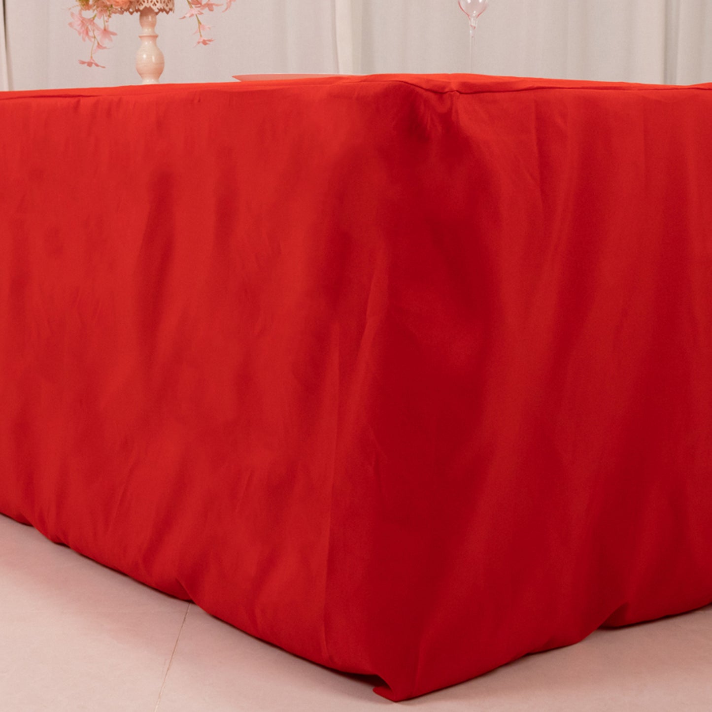 Red fitted premium polyester tablecloth for 8ft tables.