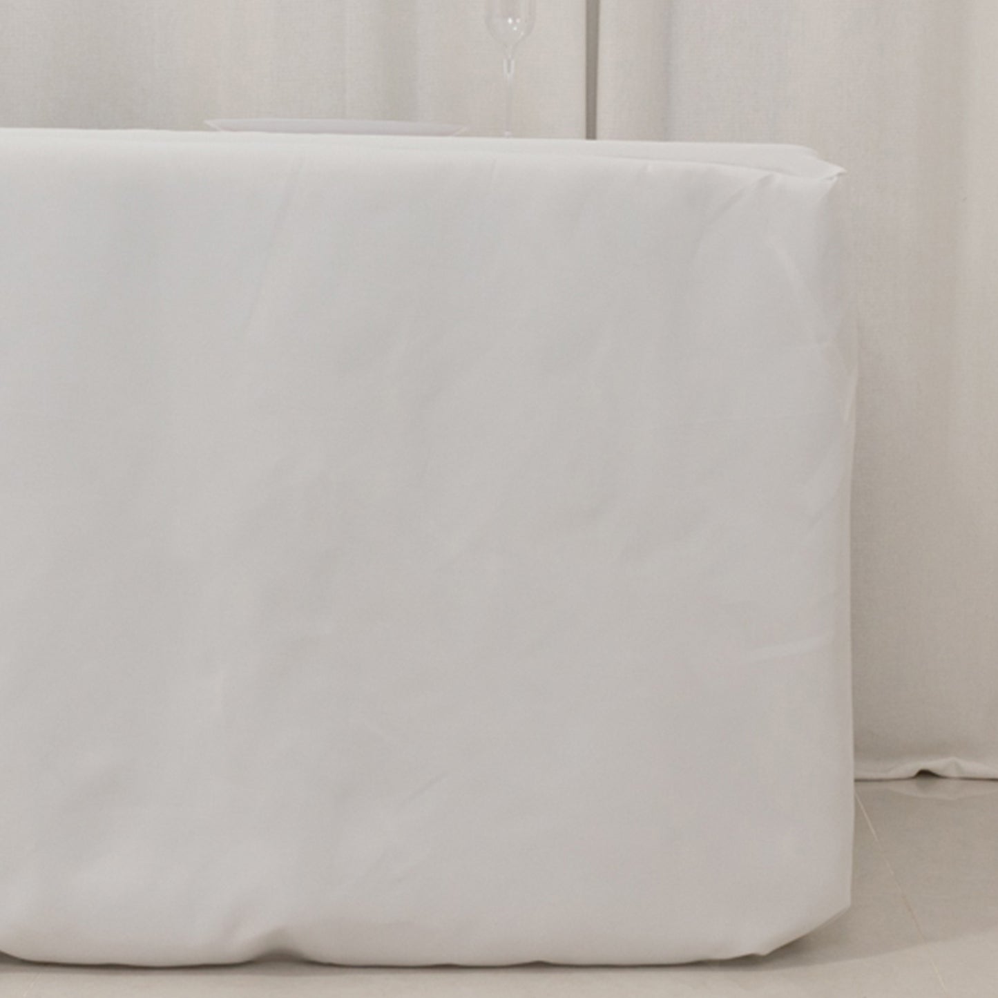 White fitted premium polyester tablecloth for 8ft tables.