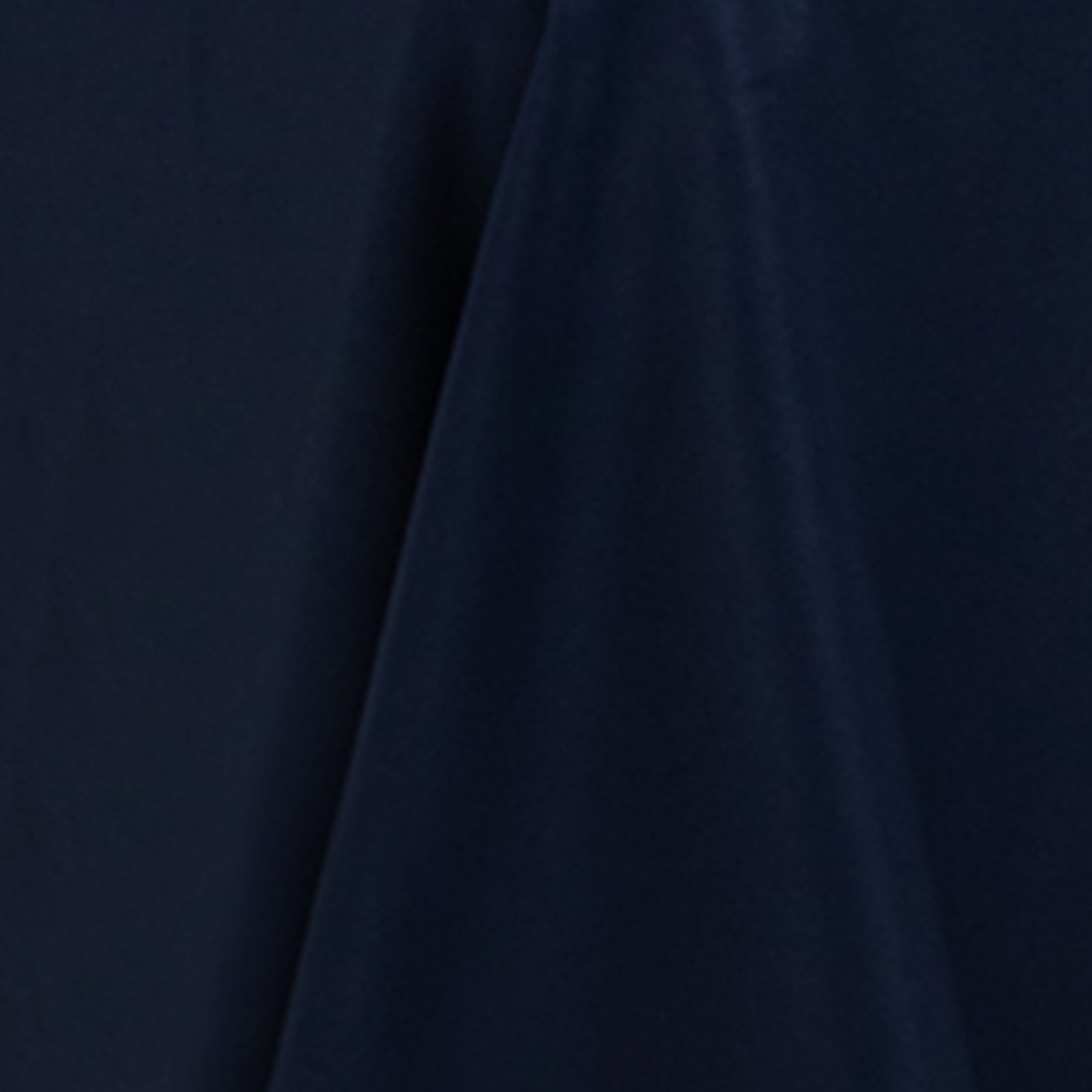 Navy blue round tablecloth made of premium fire retardant polyester.