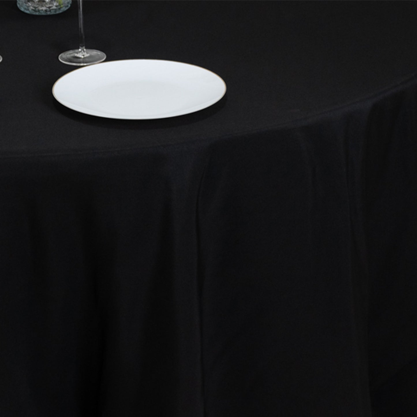 Black seamless tablecloth for 5-foot table with floor-length drop.