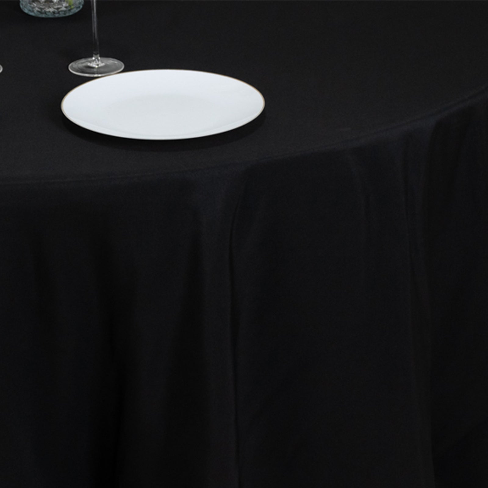 Black seamless tablecloth for 5-foot table with floor-length drop.
